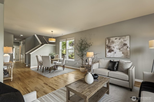 26216 SE 228th Ave SE Unit 26216, Maple Valley, WA 98038 - living area with wood finished floors, recessed lighting, and stairway