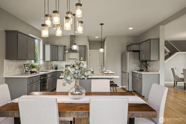 26216 SE 228th Ave SE Unit 26216, Maple Valley, WA 98038 - dining space with wood finished floors and recessed lighting