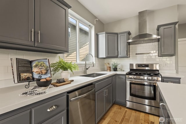 26216 SE 228th Ave SE Unit 26216, Maple Valley, WA 98038 - kitchen with appliances with stainless steel finishes, wall chimney range hood, gray cabinetry, and light countertops