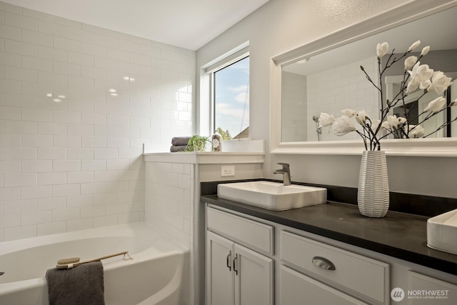 26216 SE 228th Ave SE Unit 26216, Maple Valley, WA 98038 - bathroom featuring a bathtub and double vanity