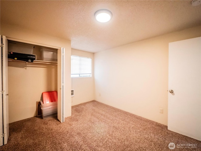 919 Harding Rd, Elma, WA 98541 - unfurnished bedroom with carpet, a closet, and a textured ceiling