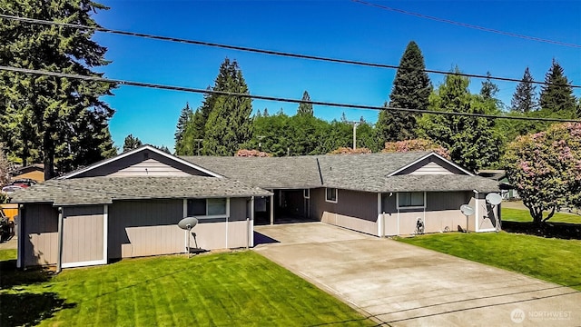 919 Harding Rd, Elma, WA 98541 - ranch-style home with concrete driveway, a shingled roof, and a front yard