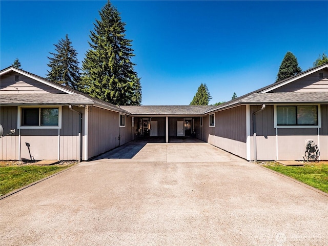 919 Harding Rd, Elma, WA 98541 - view of front of home featuring driveway, an attached carport, and a shingled roof