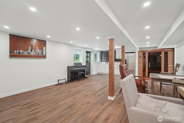 18725 NE 128th Way, Redmond, WA 98052 - living room featuring recessed lighting and light wood-style flooring