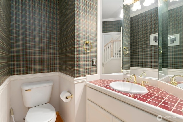 15831 Manion Way NE, Duvall, WA 98019 - bathroom featuring wallpapered walls, toilet, and vanity
