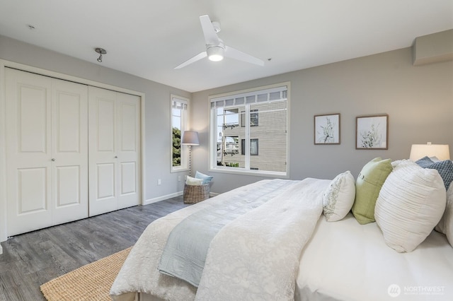 124 Bellevue Ave E Unit 305, Seattle, WA 98102 - bedroom featuring wood finished floors, a closet, a ceiling fan, and baseboards