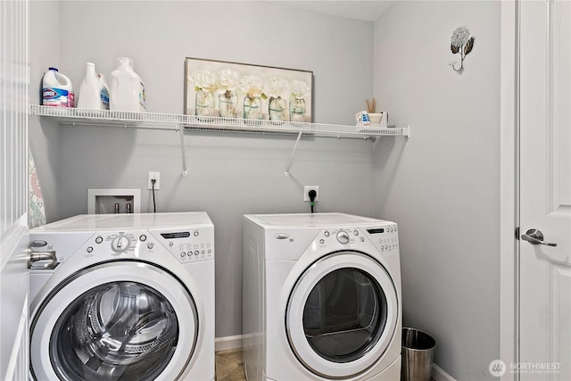 8521 15th Ave SE, Olympia, WA 98513 - laundry room with washing machine and dryer and baseboards