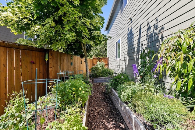 8521 15th Ave SE, Olympia, WA 98513 - fenced yard with a vegetable garden