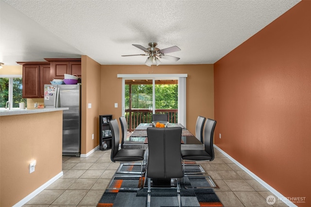 33046 38th Ave SW, Federal Way, WA 98023 - dining area with a ceiling fan, light tile patterned floors, and a textured ceiling
