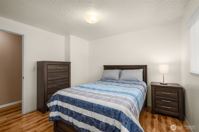 33046 38th Ave SW, Federal Way, WA 98023 - bedroom with wood finished floors and a textured ceiling