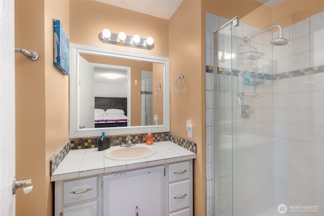 33046 38th Ave SW, Federal Way, WA 98023 - ensuite bathroom featuring a shower stall, vanity, and tasteful backsplash