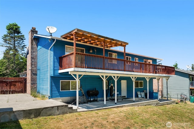 33046 38th Ave SW, Federal Way, WA 98023 - back of house featuring a chimney and a patio area