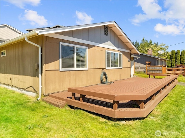 8828 S K St, Tacoma, WA 98444 - back of property with a lawn and a deck
