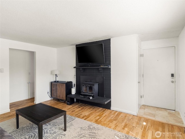8828 S K St, Tacoma, WA 98444 - living room featuring wood finished floors