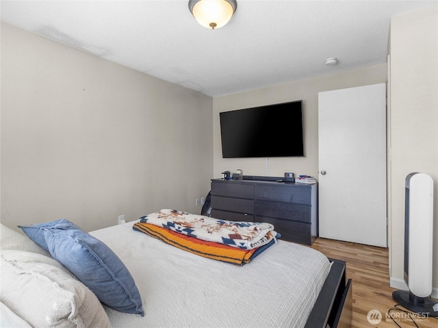 8828 S K St, Tacoma, WA 98444 - bedroom featuring light wood finished floors