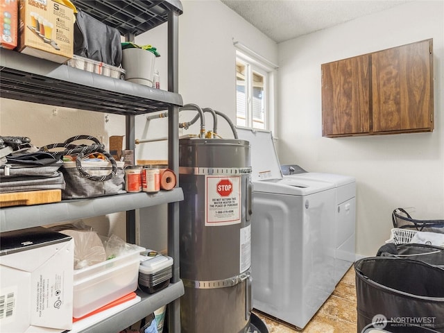 8828 S K St, Tacoma, WA 98444 - laundry room featuring secured water heater, cabinet space, independent washer and dryer, and a textured ceiling
