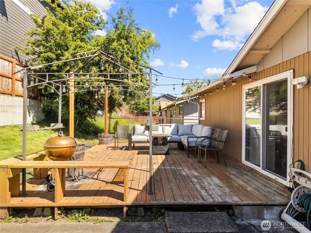 8828 S K St, Tacoma, WA 98444 - wooden terrace with an outdoor living space