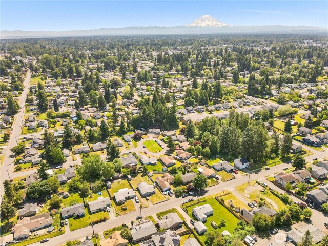 8828 S K St, Tacoma, WA 98444 - aerial perspective of suburban area with mountains