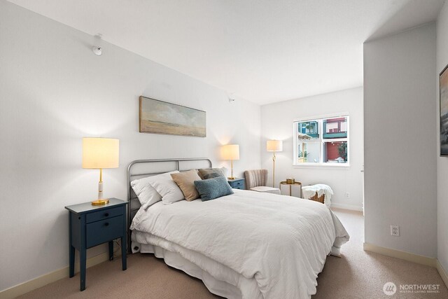 2331 42nd Ave SW Unit 206, Seattle, WA 98116 - bedroom with carpet floors and baseboards