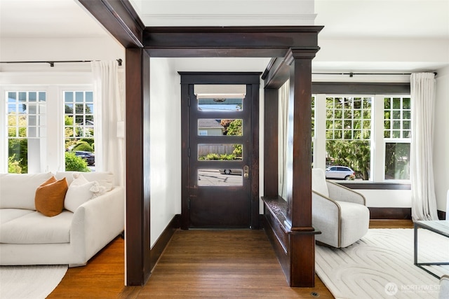 106 W Mcgraw St, Seattle, WA 98119 - foyer entrance featuring dark wood finished floors, healthy amount of natural light, and baseboards