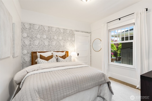 106 W Mcgraw St, Seattle, WA 98119 - bedroom with carpet floors, wallpapered walls, and baseboards