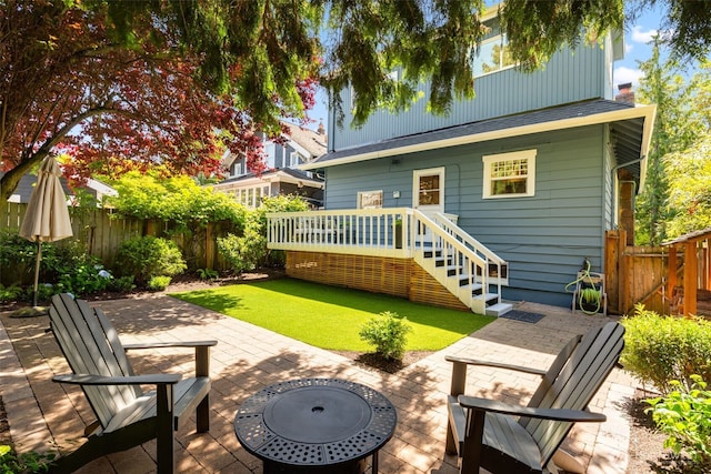 106 W Mcgraw St, Seattle, WA 98119 - back of property with an outdoor fire pit, a fenced backyard, and a patio area