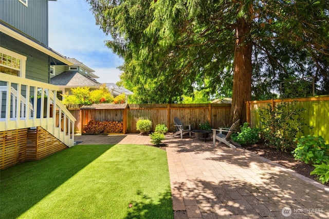 106 W Mcgraw St, Seattle, WA 98119 - view of yard featuring a patio, a fire pit, and stairway