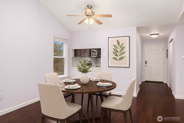 11113 NE 125th Ln Unit E-319, Kirkland, WA 98034 - dining space featuring dark wood-style flooring, baseboards, a ceiling fan, and lofted ceiling