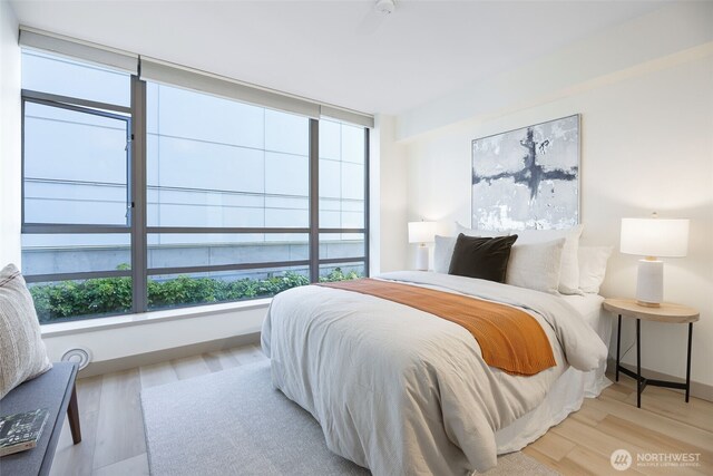 2929 1st Ave Unit 319, Seattle, WA 98121 - bedroom with wood finished floors