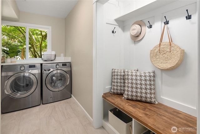 2260 269th Ct SE, Sammamish, WA 98075 - laundry room featuring washing machine and dryer and baseboards