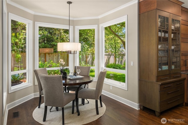 2260 269th Ct SE, Sammamish, WA 98075 - dining area featuring baseboards, crown molding, and dark wood finished floors