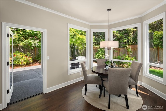 2260 269th Ct SE, Sammamish, WA 98075 - dining room with baseboards, dark wood finished floors, and crown molding