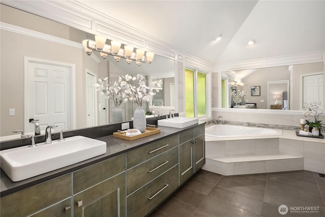 2260 269th Ct SE, Sammamish, WA 98075 - bathroom with a garden tub, double vanity, lofted ceiling, tile patterned floors, and crown molding