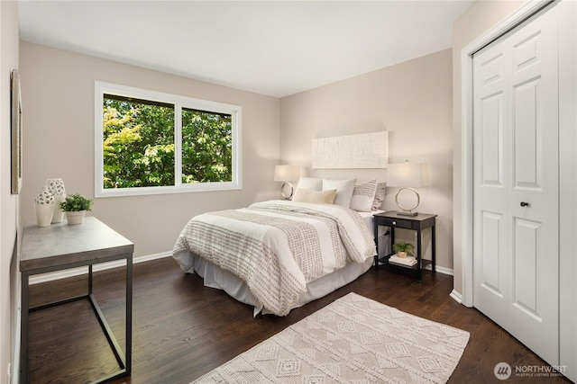 2260 269th Ct SE, Sammamish, WA 98075 - bedroom with baseboards and dark wood finished floors