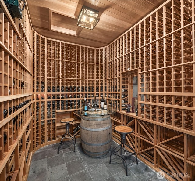2260 269th Ct SE, Sammamish, WA 98075 - wine cellar with wooden ceiling and stone finish flooring
