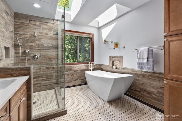 18620 29th Ave SE, Bothell, WA 98012 - bathroom featuring tile walls, a skylight, a stall shower, a soaking tub, and vanity