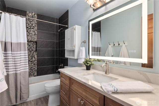 18620 29th Ave SE, Bothell, WA 98012 - bathroom featuring vanity, toilet, shower / bathtub combination with curtain, and wood finished floors