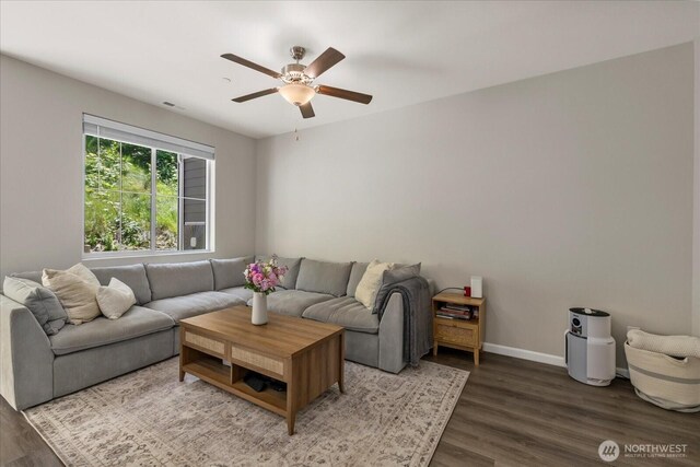 8603 E Gilman Ave, Arlington, WA 98223 - living area featuring wood finished floors, a ceiling fan, and baseboards