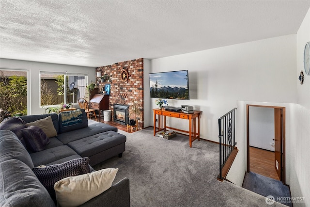 17464 Dunbar Rd Unit 1, Mount Vernon, WA 98273 - carpeted living room featuring a textured ceiling and a wood stove