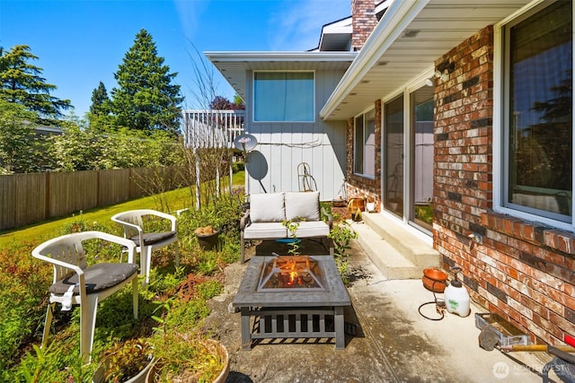 17464 Dunbar Rd Unit 1, Mount Vernon, WA 98273 - view of patio / terrace featuring an outdoor fire pit