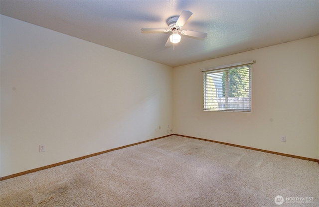 712 SE 5th Way, Battle Ground, WA 98604 - empty room with carpet floors, baseboards, and a ceiling fan