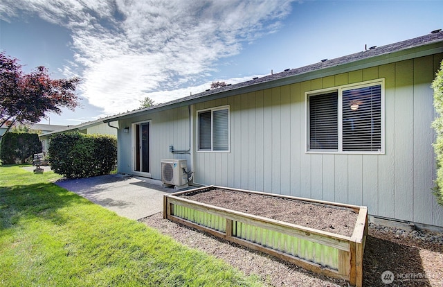 712 SE 5th Way, Battle Ground, WA 98604 - back of house featuring ac unit, a patio, a vegetable garden, and a yard