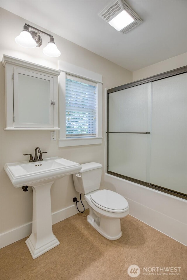 191 Compass St, Pacific Beach, WA 98571 - bathroom with baseboards and enclosed tub / shower combo