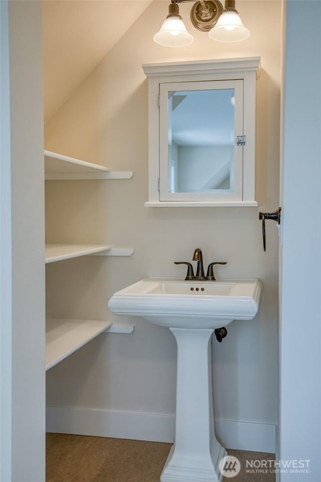 191 Compass St, Pacific Beach, WA 98571 - bathroom with a sink and baseboards