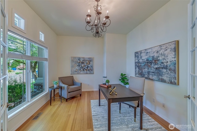 22879 NE 127th Way, Redmond, WA 98053 - office space featuring plenty of natural light, a chandelier, and light wood finished floors