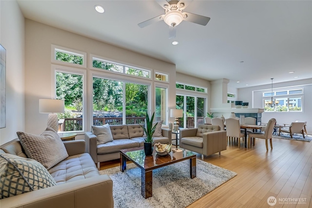 22879 NE 127th Way, Redmond, WA 98053 - living area with recessed lighting, light wood-style floors, and a ceiling fan