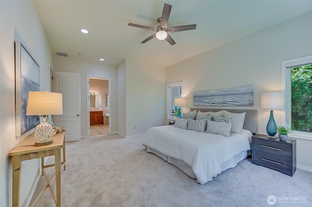 22879 NE 127th Way, Redmond, WA 98053 - bedroom with light carpet, baseboards, recessed lighting, ensuite bathroom, and a ceiling fan