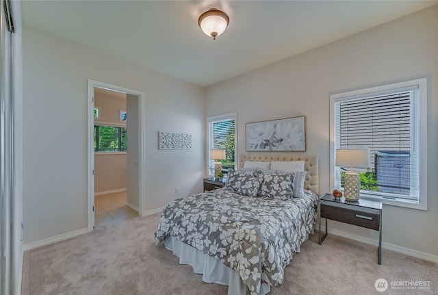22879 NE 127th Way, Redmond, WA 98053 - bedroom featuring light carpet, multiple windows, and baseboards