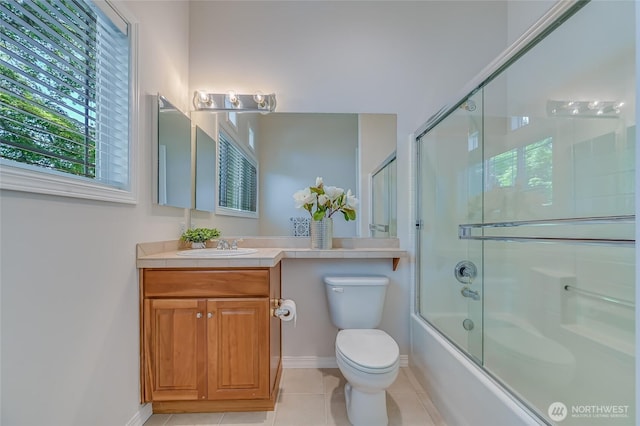 22879 NE 127th Way, Redmond, WA 98053 - bathroom featuring healthy amount of natural light, vanity, toilet, and enclosed tub / shower combo