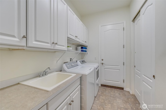 22879 NE 127th Way, Redmond, WA 98053 - laundry room with washing machine and dryer, cabinet space, and stone finish floors